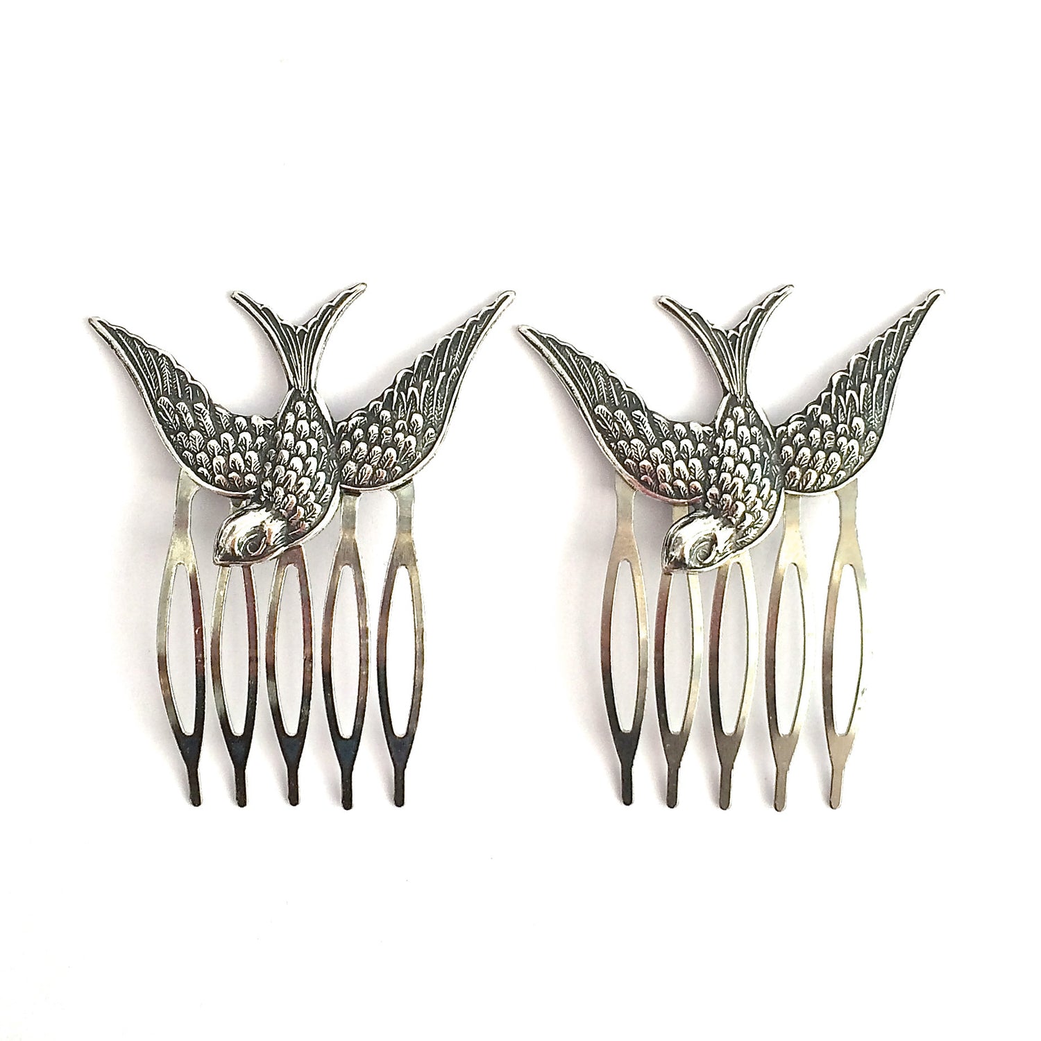 SILVER SWALLOW COMB